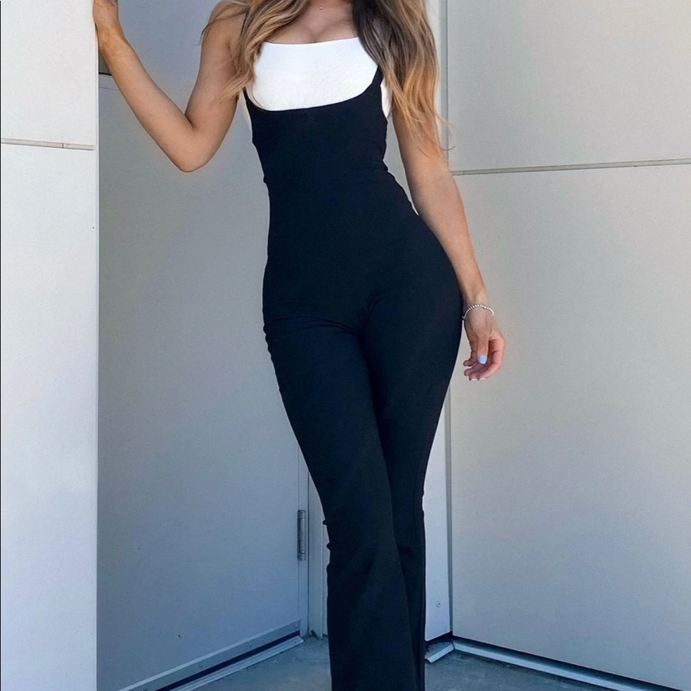 Suspender jumpsuit with flare pant